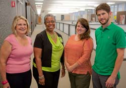 Midwest Child-Parent Center Expansion Professional Development staff standing in an Erikson hallway