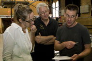 Sue Gill, director Mike Dutka, and Jim Gill discuss their next scene.