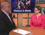 Thumbnail of Margret Nickels on WGN with Dean Richards discussing the effects of violence in the media on children.