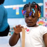 Girl learning with blocks