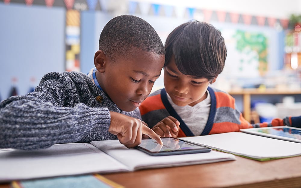 two boys on tablet