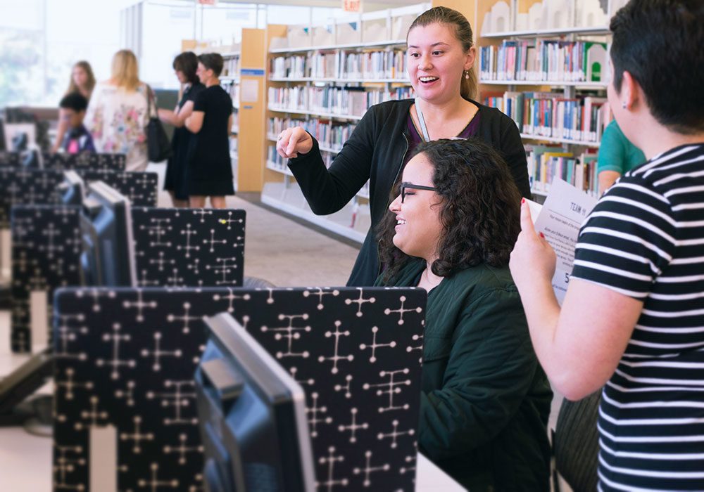 Erikson students in Edward Neisser Library