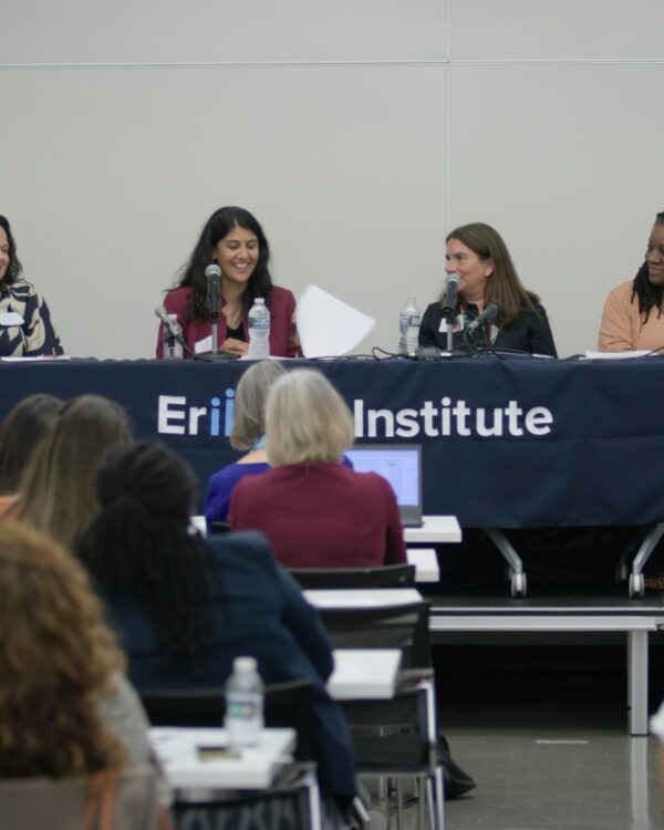 ACF & Erikson Institute panel of speakers sitting at large table facing the audience