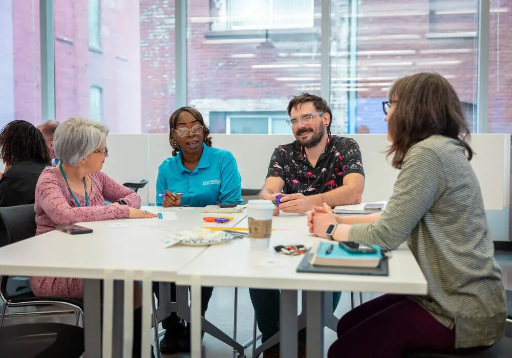 Early childhood professionals in a workshop discussion on narrative power, community-centered data, and equity at Erikson Institute