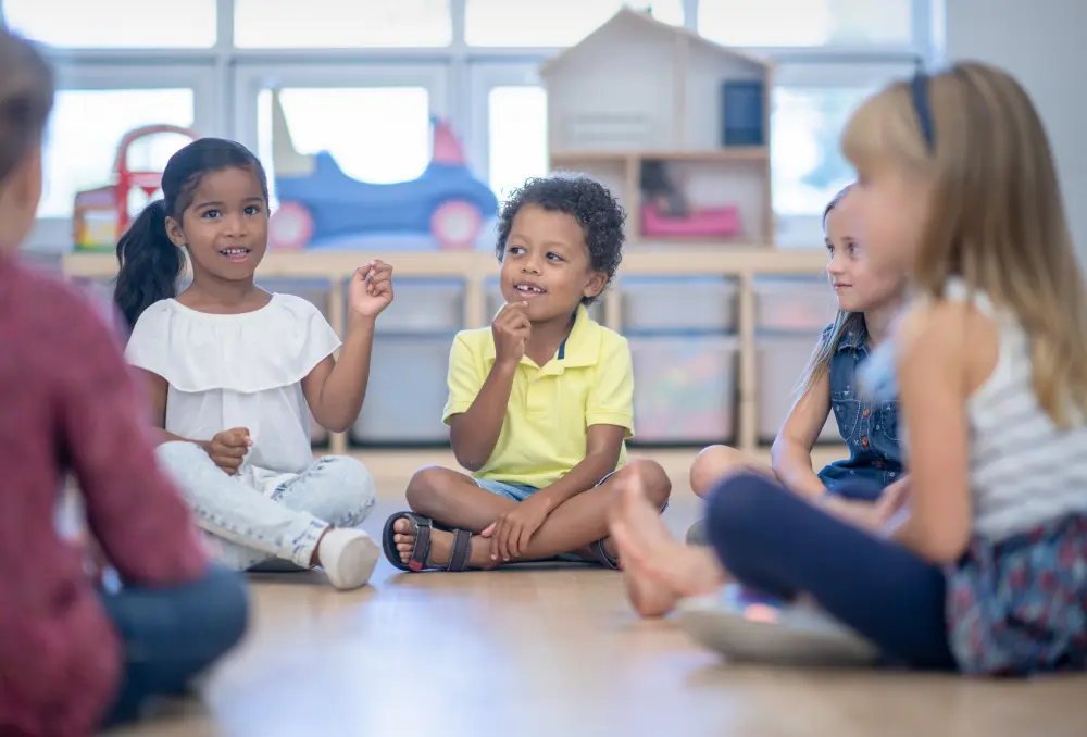 kids in a circle paying attention