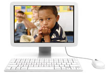 Computer showing boys in a preschool classroom